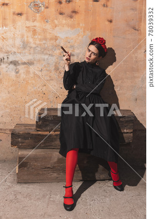 Young woman actress in art action remaking greatest paintings on brick background. Retro style, comparison of eras concept. Young woman actress in art action remaking greatest paintings on brick background. Retro style, comparison of eras concept. 78039332
