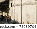 Old street fountain with a copper bowl Tas and carved flower on the wall in Safranbolu. UNESCO site. Turkey. 78039704