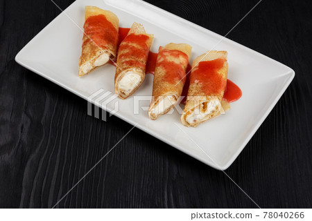 Pancakes stuffed with cream Pancakes stuffed with cream 78040266