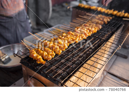 chicken satay grilled on grills plate with smoke chicken satay grilled on grills plate with smoke 78040766