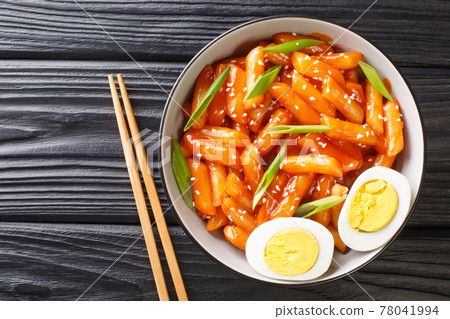 Hot and spicy rice cake Tteokbokki recipe close-up in a bowl. horizontal top view 78041994