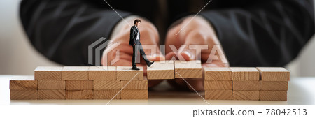 Conceptual image of business teamwork and cooperation Conceptual image of business teamwork and cooperation 78042513
