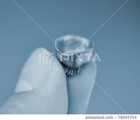 Small object printed on metal 3d printer macro. Small object printed on metal 3d printer macro. 78045354