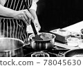 Chef cooking in a kitchen, chef at work, Black and White. 78045630