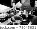 Chef cooking in a kitchen, chef at work, Black and White. 78045631