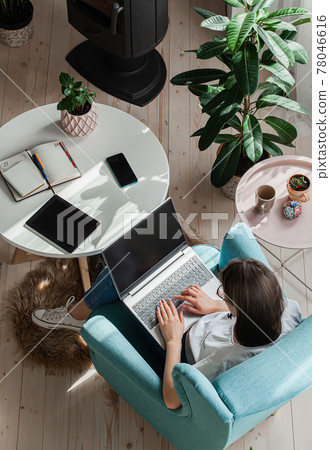 Young woman using laptop to work home, remote work Young woman using laptop to work home, remote work 78046616