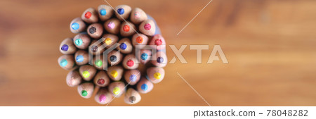 Many multicolored pencils on wooden background top view 78048282