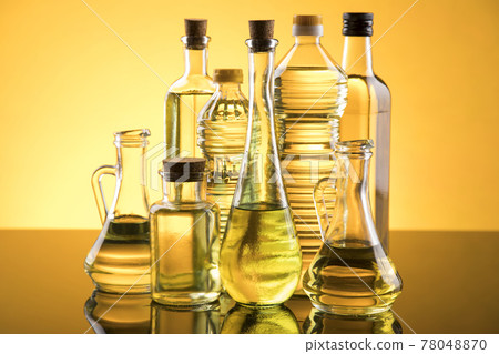 Bottles with organic cooking olive oil Bottles with organic cooking olive oil 78048870