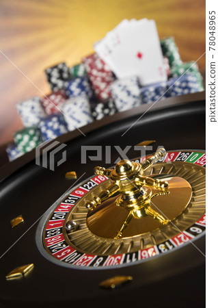 Roulette wheel running in a casino, Poker Chips Roulette wheel running in a casino, Poker Chips 78048965