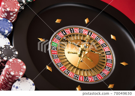 Roulette wheel running in a casino, Poker Chips Roulette wheel running in a casino, Poker Chips 78049630