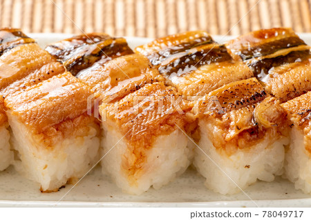 Up of grilled conger eel sushi. 78049717