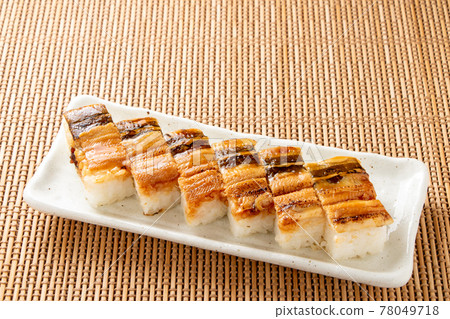 Grilled conger eel sushi. 78049718