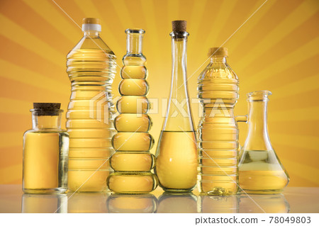 Olive oil bottles, olive branch and Cooking oils Olive oil bottles, olive branch and Cooking oils 78049803