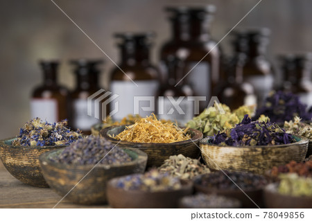 Homeopathy, herbal medicine on wooden table 78049856