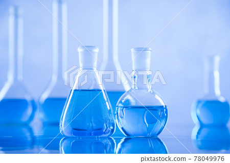 Laboratory beakers,Science experiment, blue background Laboratory beakers,Science experiment, blue background 78049976