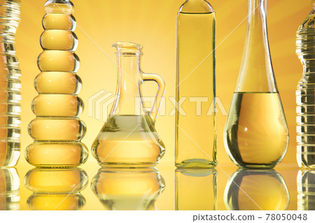 Olive oil bottles, olive branch and Cooking oils 78050048