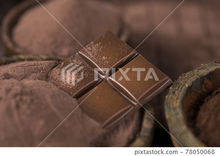 Chocolate sweet, cocoa pod and food dessert background Chocolate sweet, cocoa pod and food dessert background 78050068