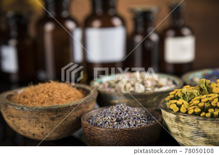 Black mirror background, Natural remedy, healing herbs Black mirror background, Natural remedy, healing herbs 78050108