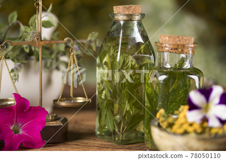 Herbs medicine and vintage wooden background Herbs medicine and vintage wooden background 78050110
