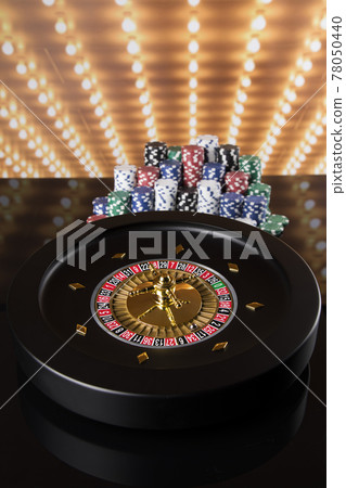Poker Chips, Roulette wheel in motion, casino background Poker Chips, Roulette wheel in motion, casino background 78050440
