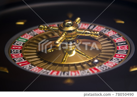 Roulette wheel in motion in a casino background 78050490