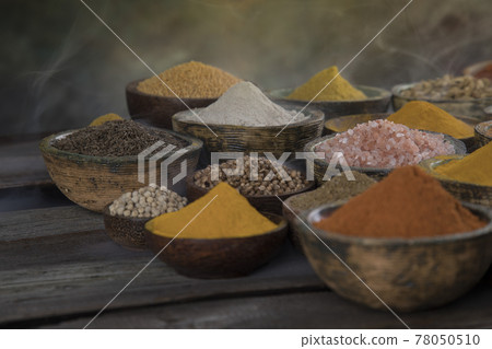 Colorful spices in bowl background Colorful spices in bowl background 78050510
