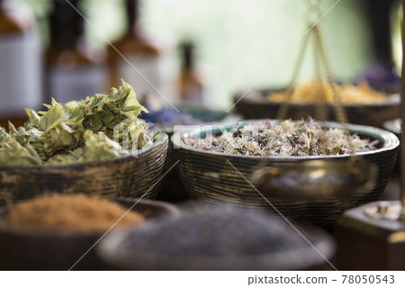 Natural remedy and wooden table background Natural remedy and wooden table background 78050543