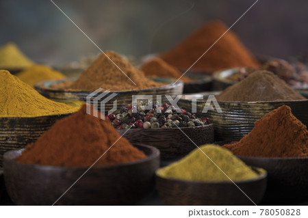 Spices on wooden bowl background Spices on wooden bowl background 78050828