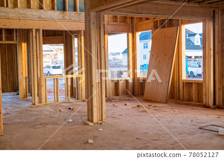 View framing unfinished of a apartment residential construction wall 78052127