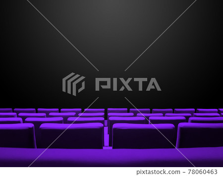 Cinema movie theatre with purple seats rows and a black background 78060463