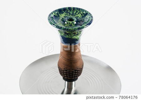 Spotted ceramic hookah bowl on white background. Spotted ceramic hookah bowl on white background. 78064176