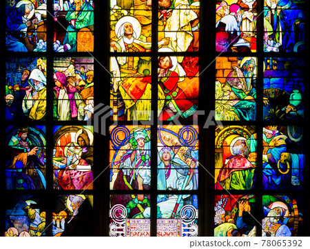 Impressive view of art nouveau stained glass window by Alfons Mucha, St. Vitus Cathedral, Prague castle, Czech Republic 78065392