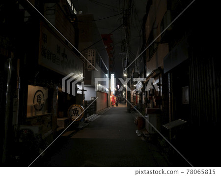 A bar in a back alley that is quiet due to the corona A bar in a back alley that is quiet due to the corona 78065815