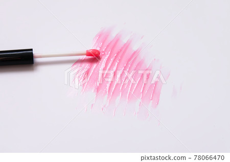 Hand drawn shape of the heart. Sample of pink lip gloss on a white background. 78066470