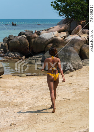 Portrait of thai woman posing outdoors at the sea beach Portrait of thai woman posing outdoors at the sea beach 78069213