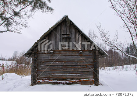 Old wooden building of bathhouse in the village. Traditional exterior oin Russian style. 78071372