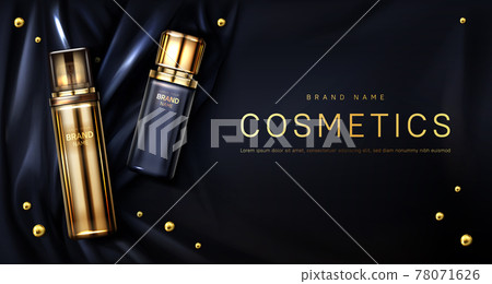 Perfume bottle on black silk fabric background 78071626