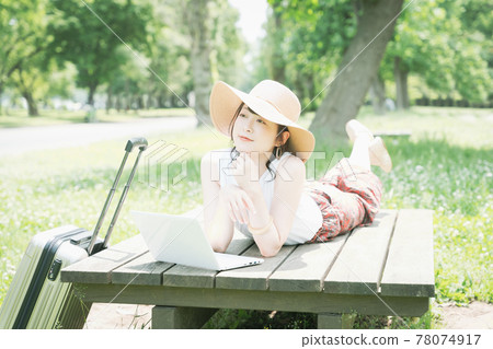 A young woman worcation in the fresh green A young woman worcation in the fresh green 78074917