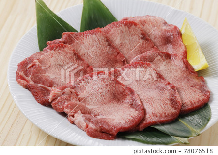 Beef tongue on a plate 78076518