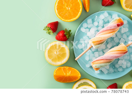 Spiral colorful popsicle with fruit Spiral colorful popsicle with fruit 78078743