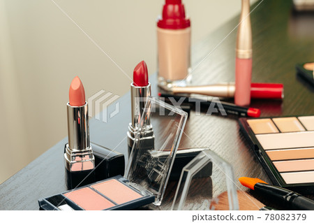 Make up products on vanity table close up Make up products on vanity table close up 78082379
