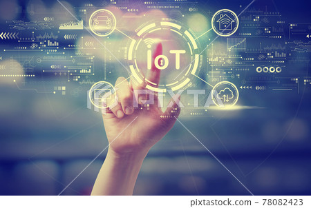 IoT theme with a hand pressing a button 78082423