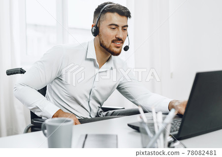 Disabled young man businessman working from home 78082481