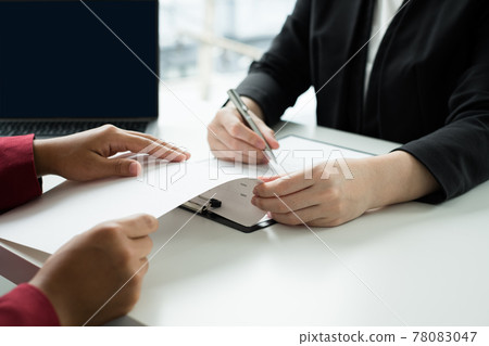 Business people hold a resume and talk to job applicants for job interviews about careers and Their personal history in the company. Recruitment concepts Business people hold a resume and talk to job applicants for job interviews about careers and Their personal history in the company. Recruitment concepts 78083047