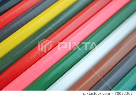 A background of multi-colored pencils for drawing lined with even stripes. Hobby and education concept. A background of multi-colored pencils for drawing lined with even stripes. Hobby and education concept. 78083302