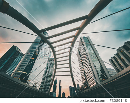 Chong Nonsi skywalk arch bridge at sky train station BTS in Sathorn business district in Bangkok 78089148