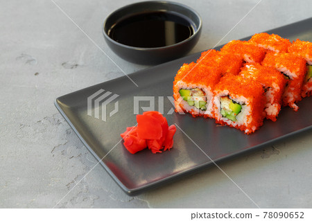 California sushi roll served on black ceramic plate California sushi roll served on black ceramic plate 78090652