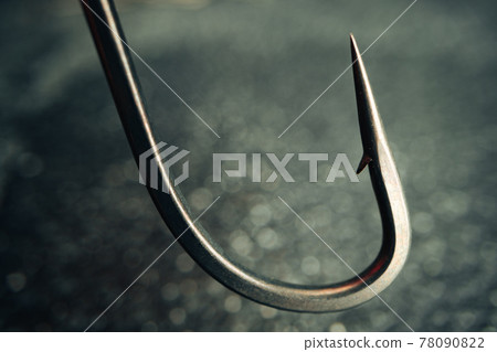 Macro photo of fishing hook on grey background 78090822