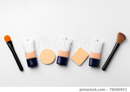 Make up liquid foundation with brush on white background Make up liquid foundation with brush on white background 78090953