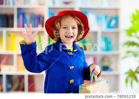 Kids in book character costume. School party. 78091238